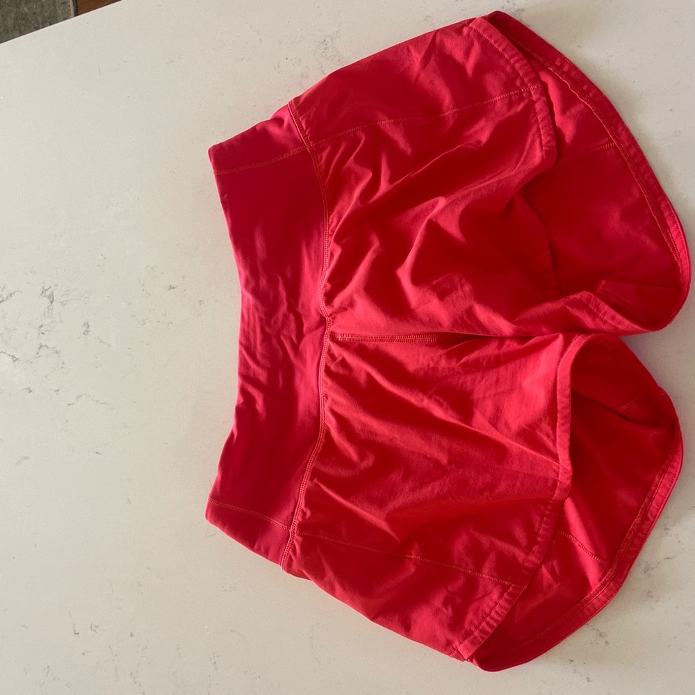 Orange/red lululemon 4” speed up shorts